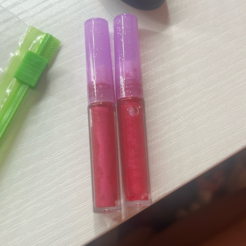 Selling 2 lipglosses from our business!